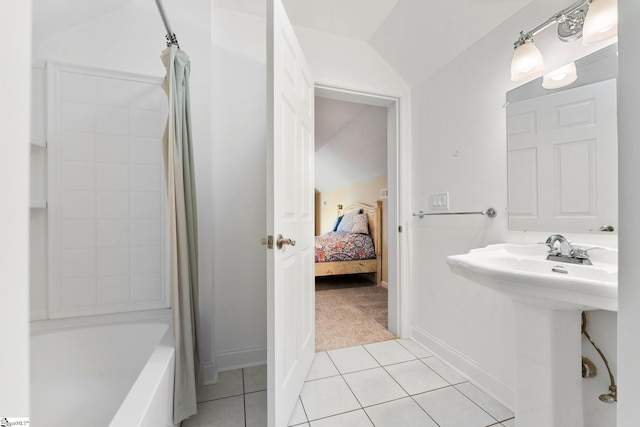 320 Nicklaus Rd, Westminster, SC 29693 - ensuite bathroom featuring shower / bath combo, baseboards, a sink, tile patterned flooring, and lofted ceiling