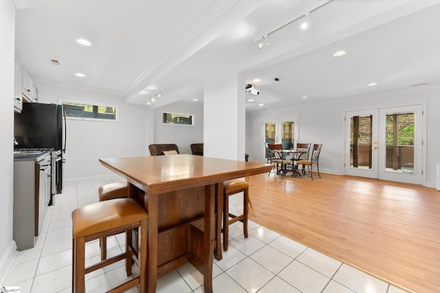 320 Nicklaus Rd, Westminster, SC 29693 - dining space with crown molding, french doors, baseboards, and recessed lighting