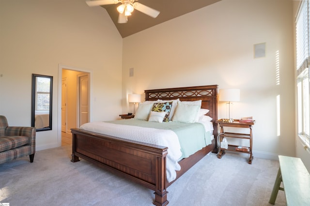 bedroom with high vaulted ceiling, carpet flooring, baseboards, and ceiling fan