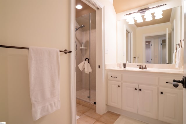 bathroom featuring a shower stall, tile patterned flooring, and vanity