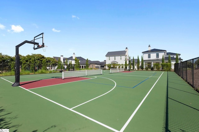 view of sport court with community basketball court and fence