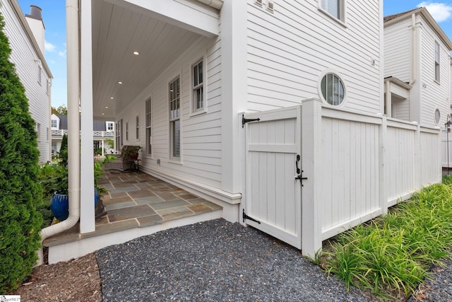 view of side of property with a patio