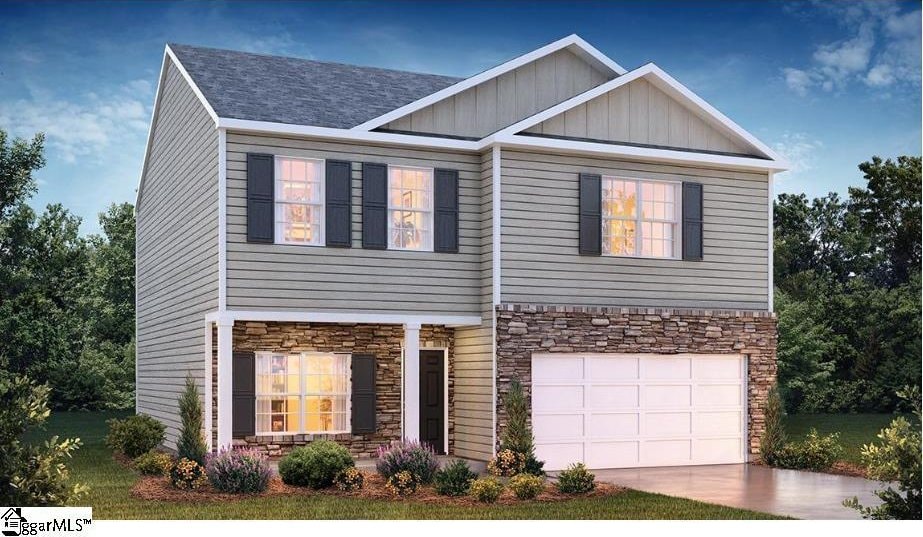 8 Kernow Ln Lot 0077, Piedmont, SC 29673 - craftsman-style house featuring a garage, driveway, stone siding, and board and batten siding