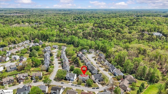 bird's eye view with a residential view and a view of trees