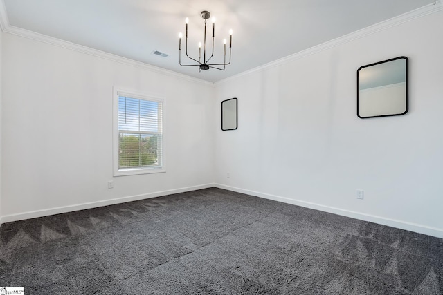 spare room with crown molding, dark colored carpet, and a chandelier