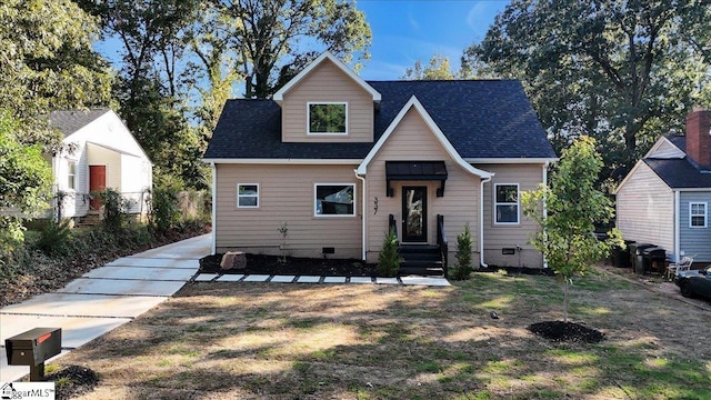 bungalow with crawl space and a shingled roof
