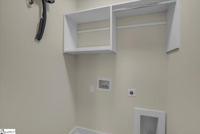 laundry room with laundry area, baseboards, hookup for a washing machine, and electric dryer hookup