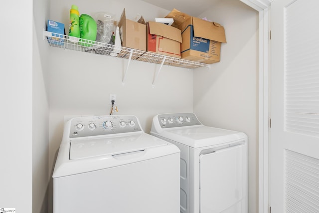laundry area with independent washer and dryer and laundry area