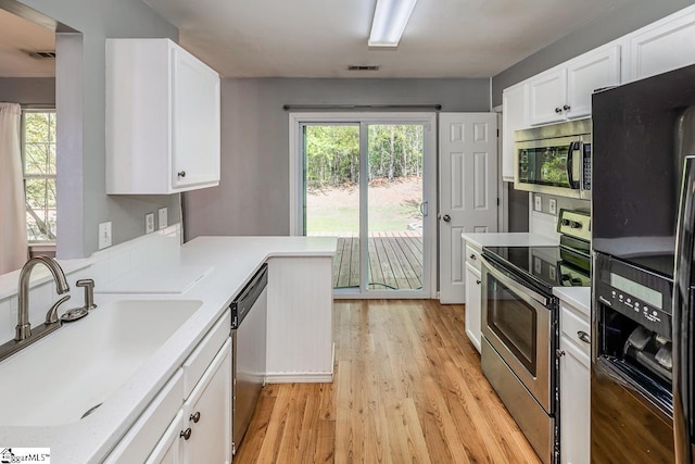 350 Hamilton Pkwy, Easley, SC 29642 - kitchen with light wood-type flooring, a sink, visible vents, and stainless steel appliances