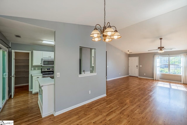 350 Hamilton Pkwy, Easley, SC 29642 - interior space featuring visible vents, light wood-style flooring, baseboards, and ceiling fan with notable chandelier