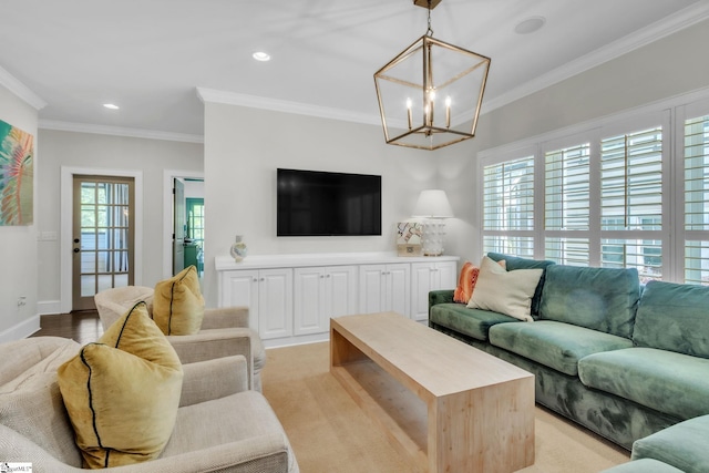 living area with ornamental molding, baseboards, recessed lighting, and a chandelier