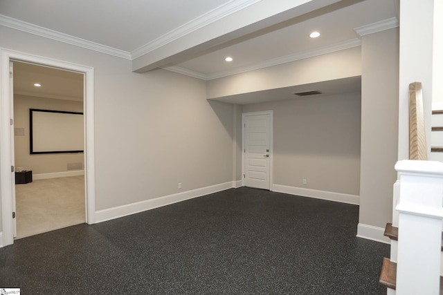 empty room featuring crown molding, baseboards, visible vents, and recessed lighting