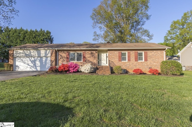 309 Frank St, Easley, SC 29642 - single story home with crawl space, a front lawn, brick siding, a garage, and driveway