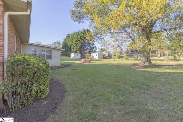 309 Frank St, Easley, SC 29642 - view of yard with a storage shed and an outdoor structure