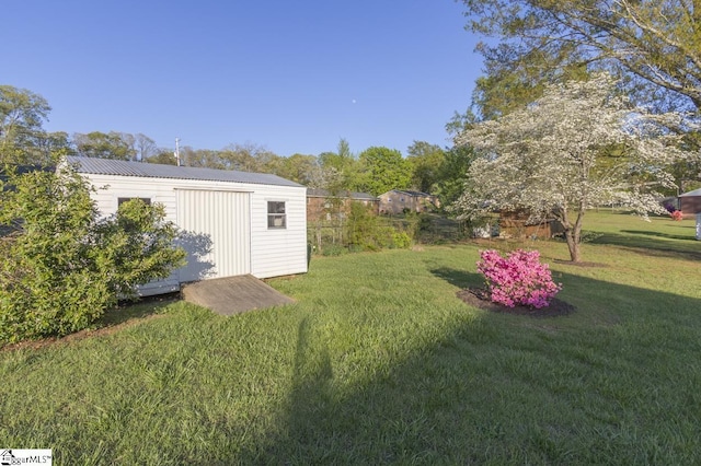309 Frank St, Easley, SC 29642 - view of yard with an outdoor structure and a storage unit