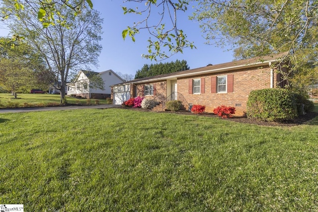 309 Frank St, Easley, SC 29642 - ranch-style house featuring a front yard, an attached garage, crawl space, aphalt driveway, and brick siding