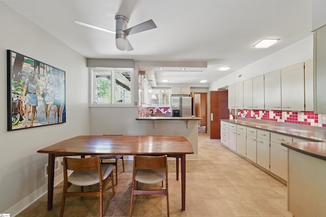 dining room with visible vents and ceiling fan