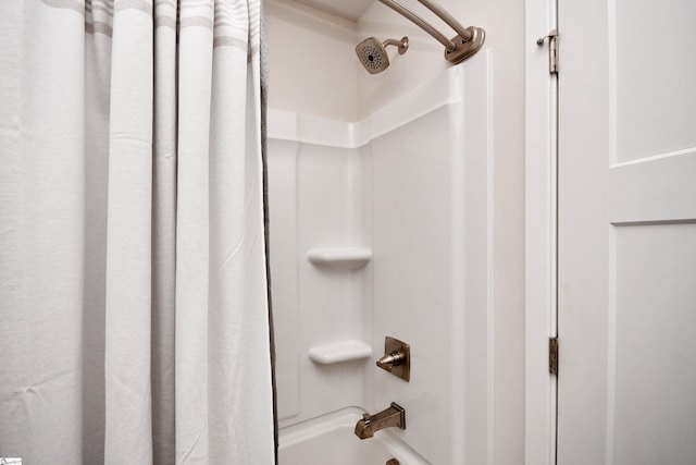 full bath featuring shower / bathtub combination with curtain