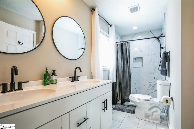 302 Pamela Ln, Laurens, SC 29360 - bathroom with toilet, marble finish floor, a sink, and visible vents