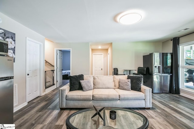 302 Pamela Ln, Laurens, SC 29360 - living area featuring visible vents, baseboards, and wood finished floors