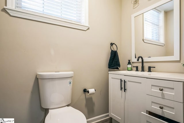 302 Pamela Ln, Laurens, SC 29360 - bathroom featuring plenty of natural light, vanity, baseboards, and toilet