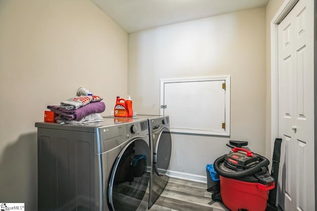 302 Pamela Ln, Laurens, SC 29360 - laundry area with separate washer and dryer, laundry area, baseboards, and wood finished floors
