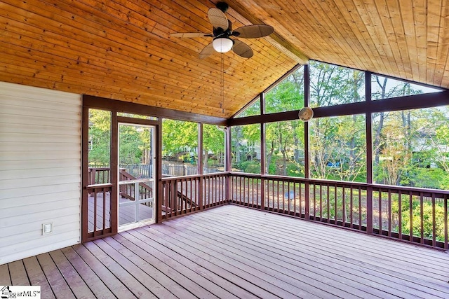 unfurnished sunroom featuring ceiling fan