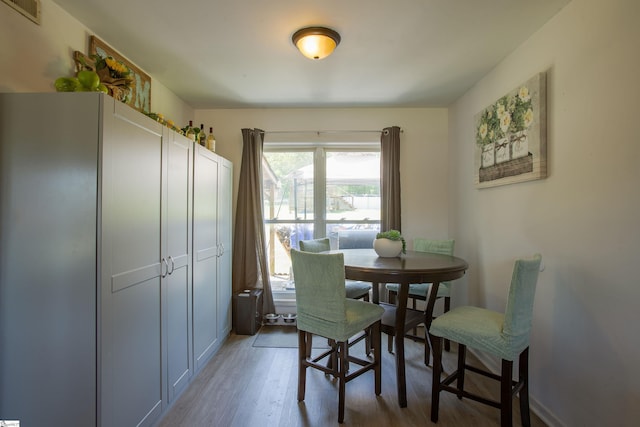 4041 N 101st Hwy, Greer, SC 29651 - dining space with visible vents and light wood-style flooring