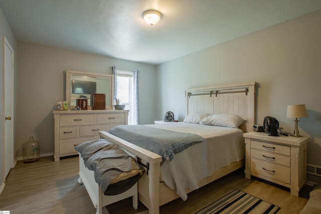 4041 N 101st Hwy, Greer, SC 29651 - bedroom featuring baseboards and light wood-style floors