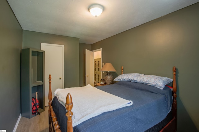 4041 N 101st Hwy, Greer, SC 29651 - bedroom featuring baseboards and wood finished floors