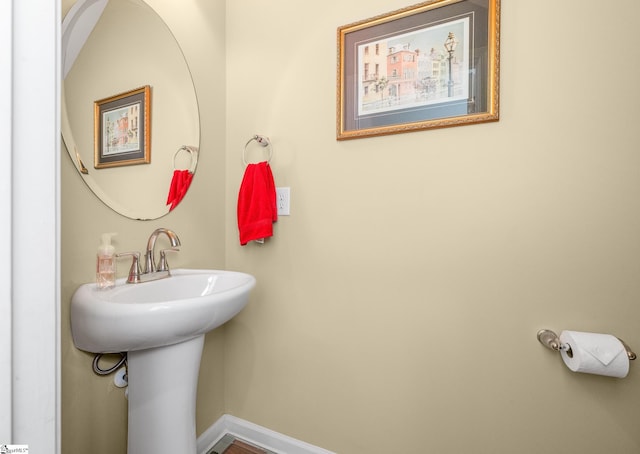 bathroom featuring baseboards