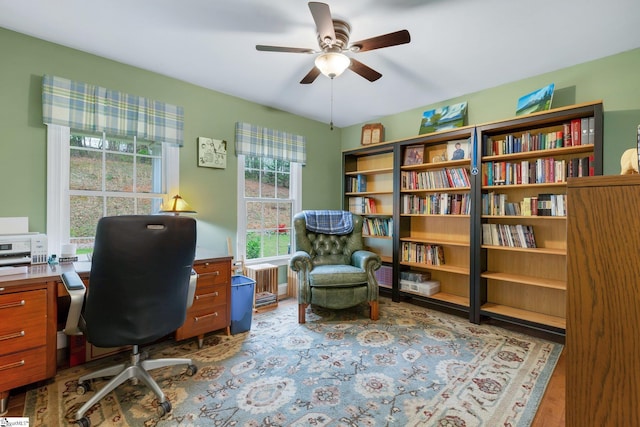 office space featuring ceiling fan