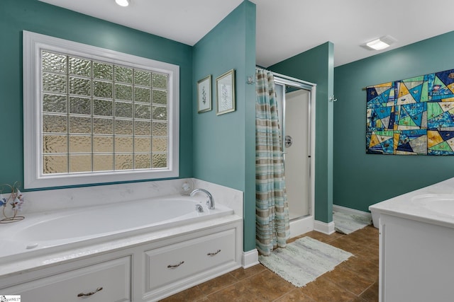bathroom featuring a shower stall, visible vents, baseboards, and a garden tub