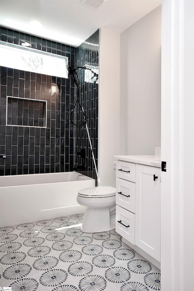 full bathroom featuring vanity, visible vents, shower / bathing tub combination, and toilet