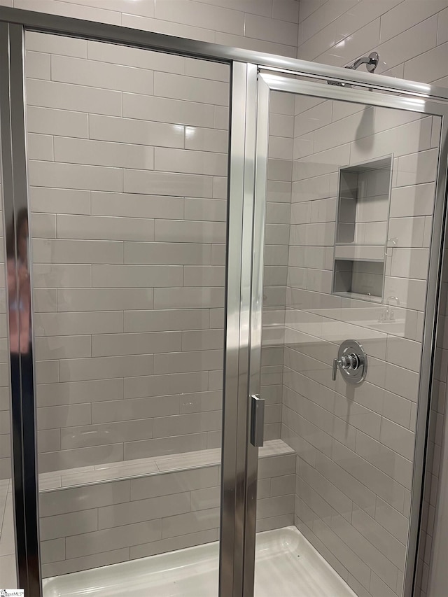 bathroom with a stall shower