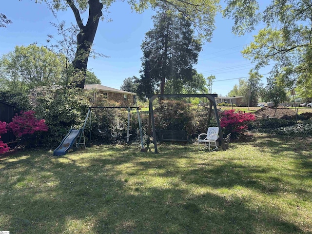 view of yard featuring a playground