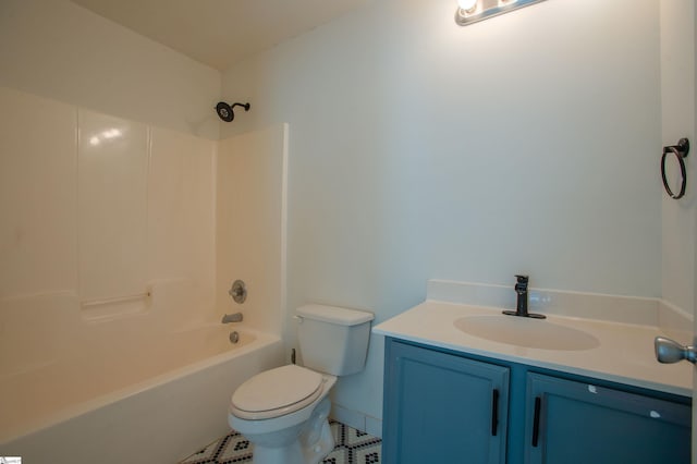 bathroom with tile patterned flooring, vanity, shower / bathing tub combination, and toilet