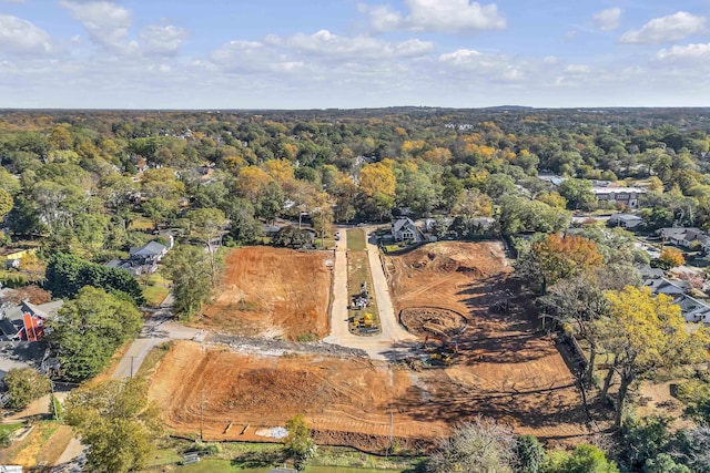 aerial view featuring a view of trees