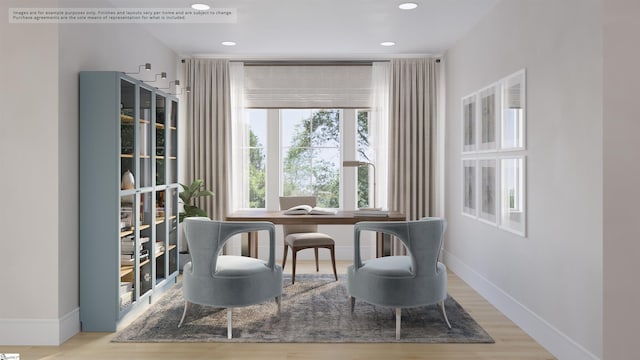 sitting room featuring recessed lighting, baseboards, and wood finished floors