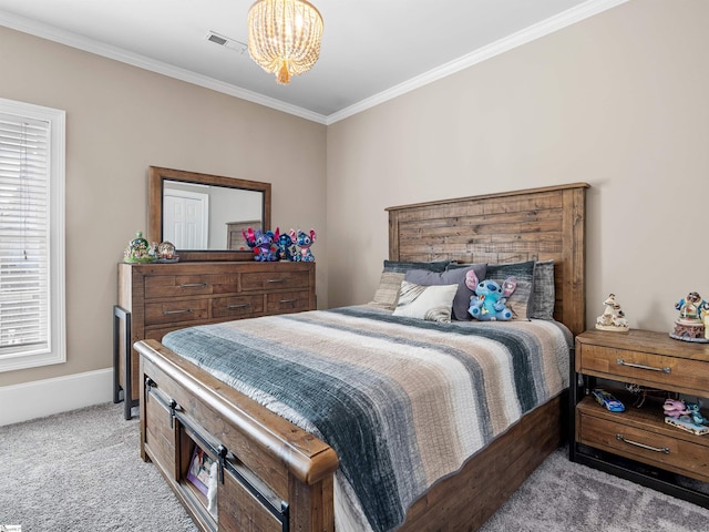 bedroom with crown molding, an inviting chandelier, visible vents, carpet floors, and baseboards