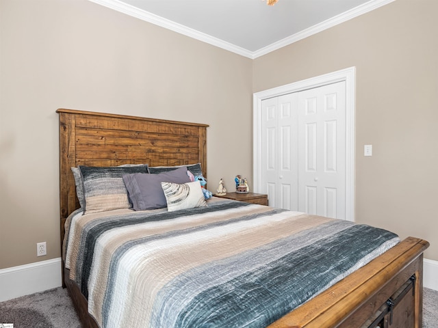 carpeted bedroom featuring baseboards and ornamental molding