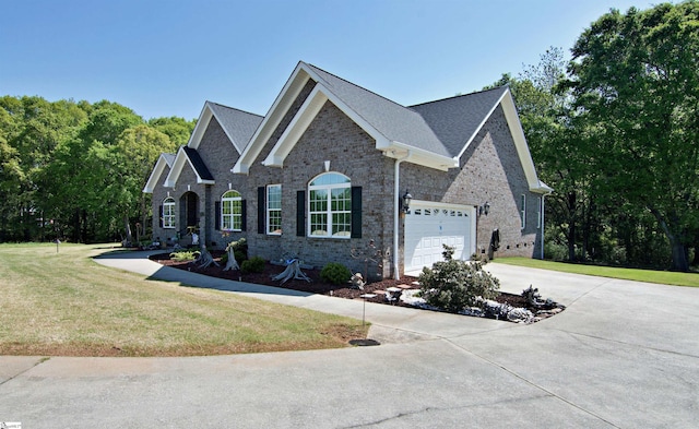 view of property exterior featuring concrete driveway, brick siding, and a lawn
