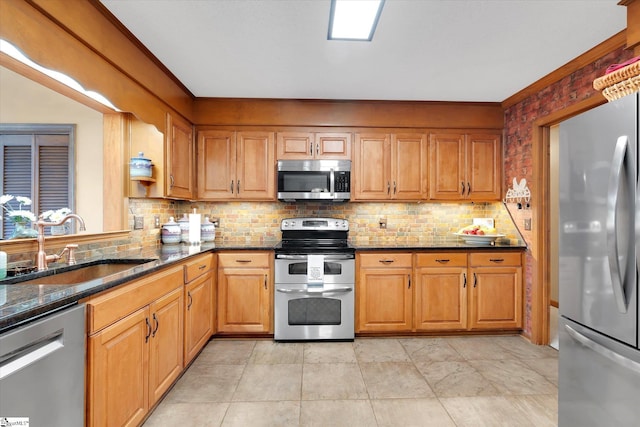 323 Long Reach Dr, Salem, SC 29676 - kitchen with a sink, decorative backsplash, appliances with stainless steel finishes, and dark stone countertops
