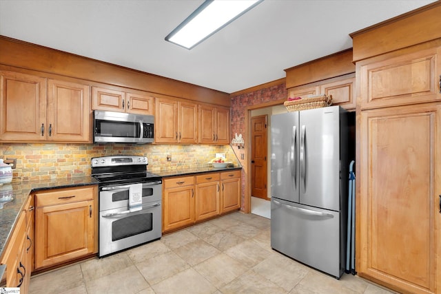 323 Long Reach Dr, Salem, SC 29676 - kitchen with dark stone counters, tasteful backsplash, and appliances with stainless steel finishes