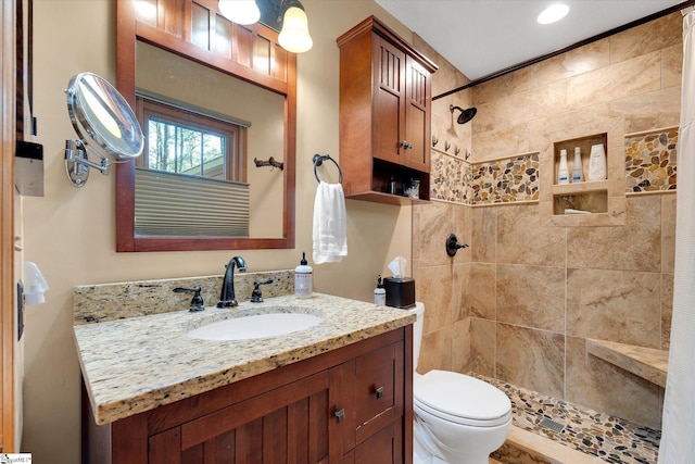 323 Long Reach Dr, Salem, SC 29676 - bathroom featuring toilet, tiled shower, and vanity