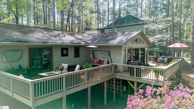 323 Long Reach Dr, Salem, SC 29676 - back of property featuring roof with shingles, a chimney, and a wooden deck