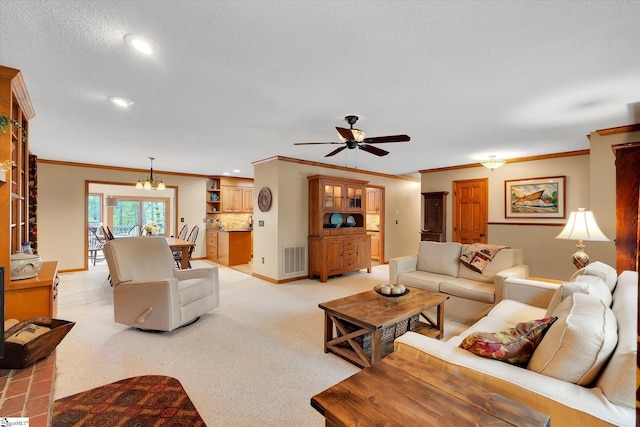 323 Long Reach Dr, Salem, SC 29676 - living room featuring crown molding, visible vents, baseboards, and ceiling fan with notable chandelier