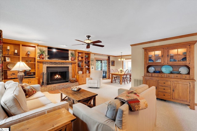 323 Long Reach Dr, Salem, SC 29676 - living area featuring ceiling fan, ornamental molding, visible vents, light carpet, and a brick fireplace