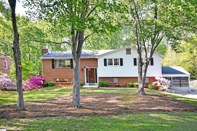 119 Hickory Ln, Mauldin, SC 29662 - split foyer home featuring a front yard and a chimney