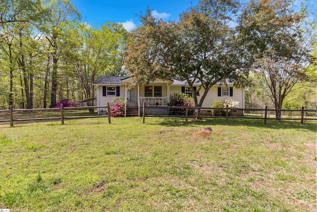 525 Firetower Rd, Williamston, SC 29697 - exterior space featuring a porch, a lawn, and a fenced front yard